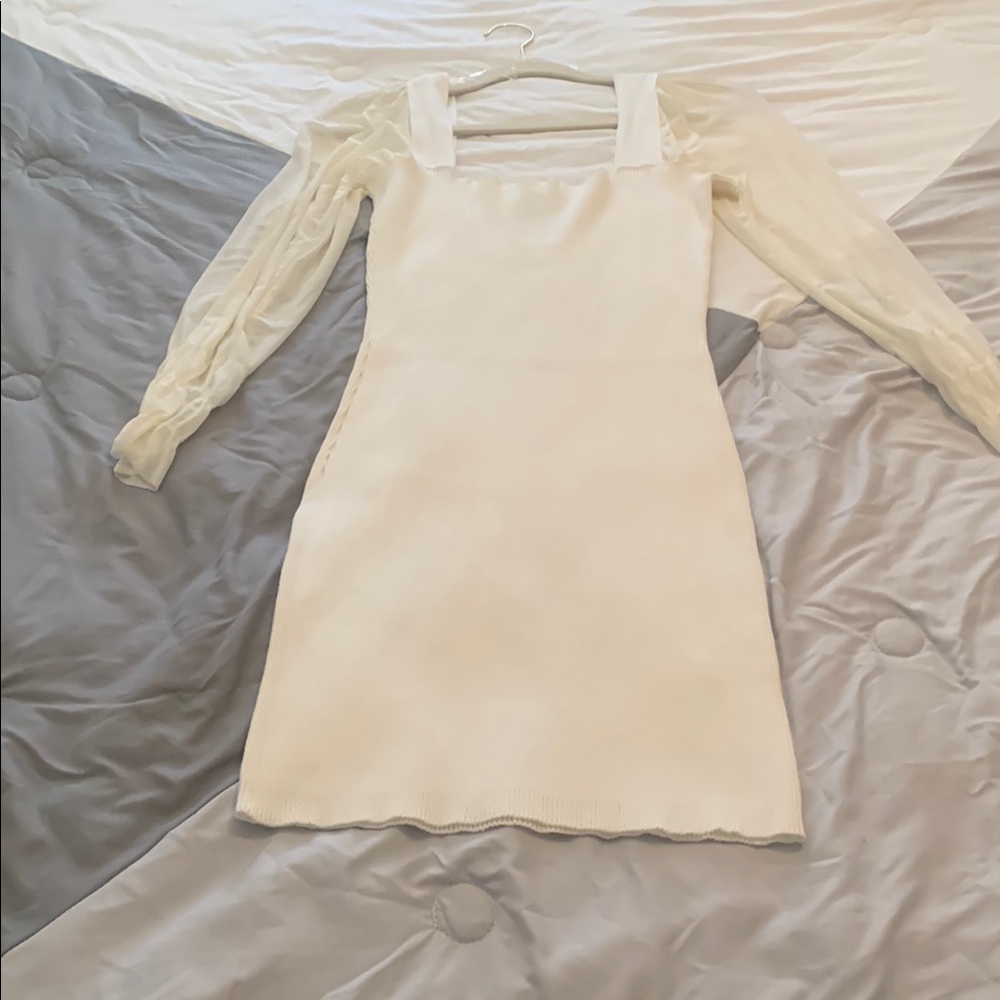Elegant Cream Dress with Sheer Sleeves
